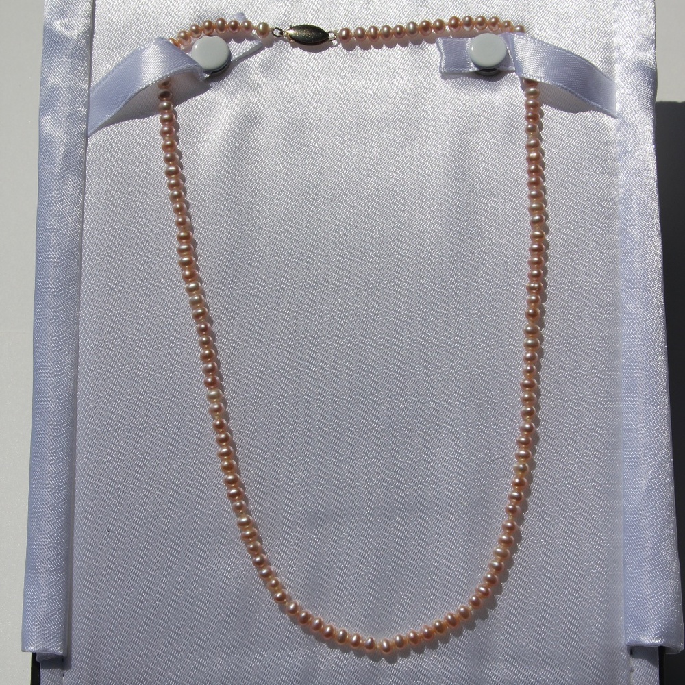 Freshwater petite pink pearl strand with 14k gold clasp